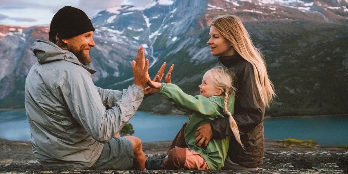 a family having fun among the mountains in Norway, one of the best places to raise a family
