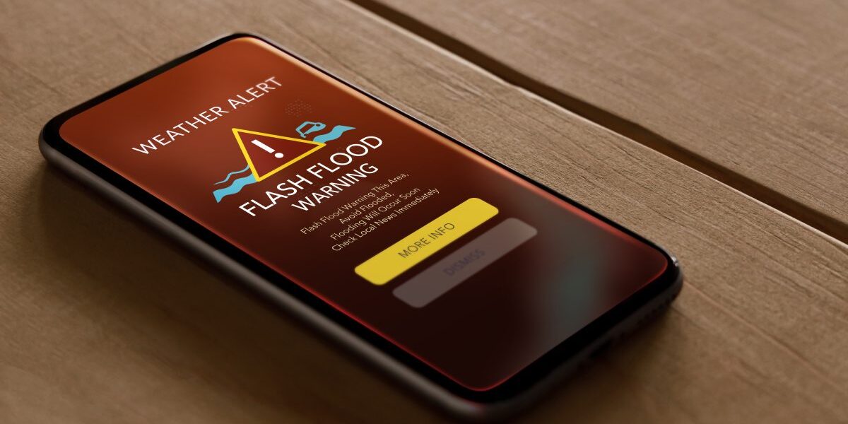 a flash flood warning on a mobile phone