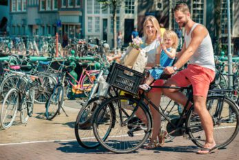 Dutch family on bikes in Amsterdam