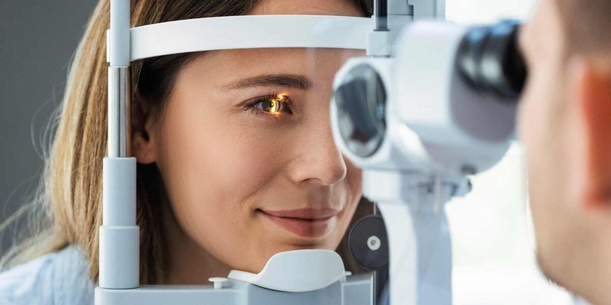 a young woman having an eye exam at an ophthalmology clinic