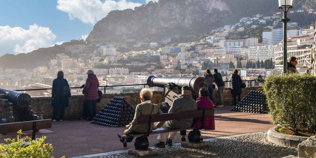 senior citizens enjoying the view of Monaco from the terrace of Palazzo Square, where life expectancy by country is the highest in the world