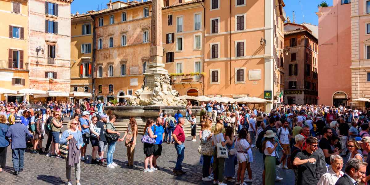 Tourists on Pantheon square in Rome, Italy, where it's advisable to have travel insurance for Italy 