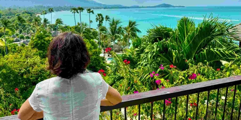 a female traveler enjoying an ocean view of Ko Samui in Thailand